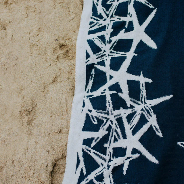 Reversible Tumbling Starfish Throw Marine/Milk